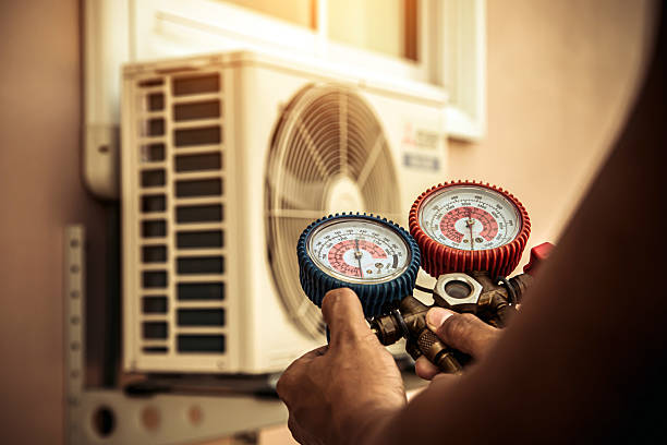 Professional Heat Pump Repair technician working in Takoma Park, MD